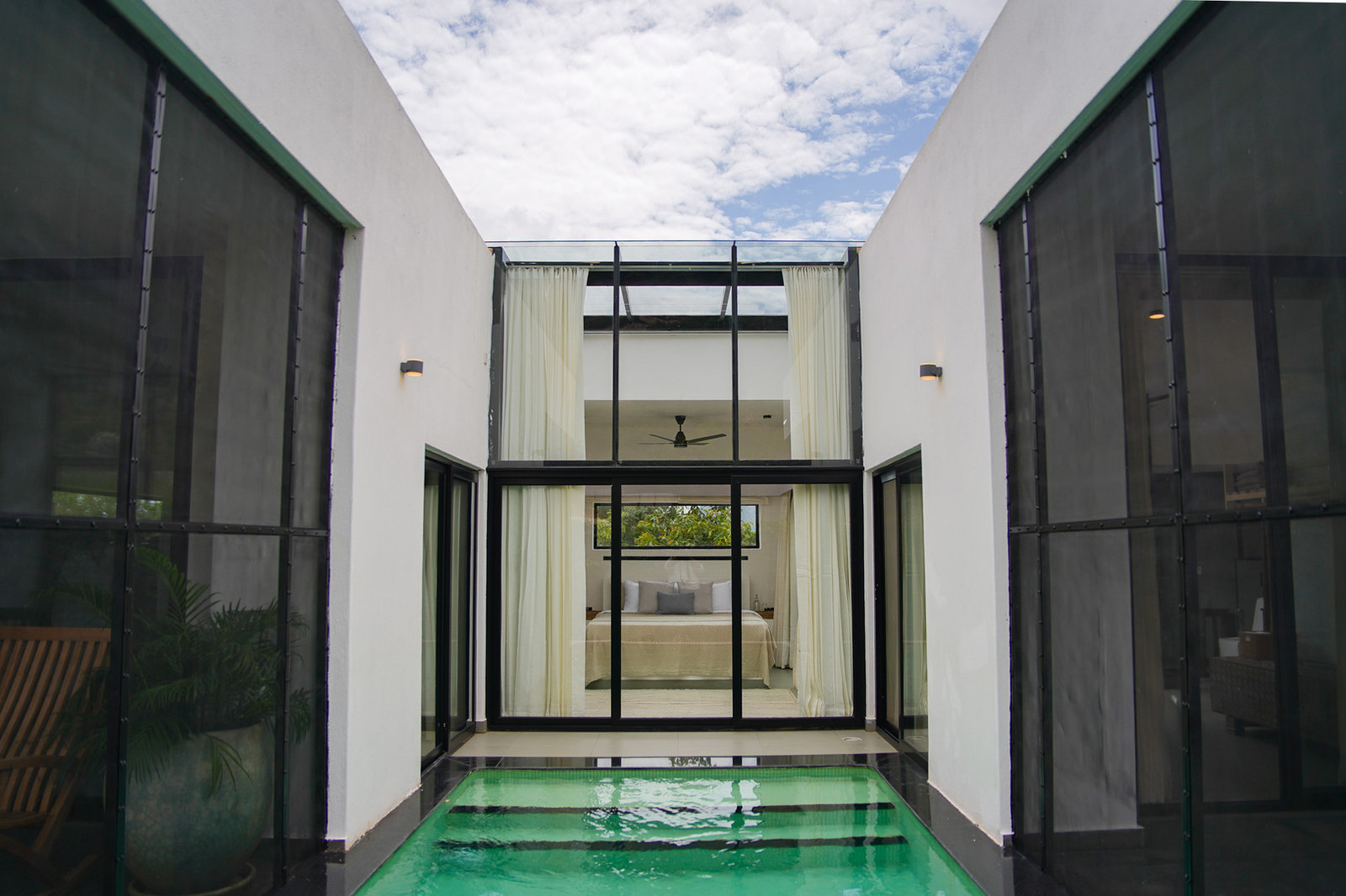 Minimal White Villa with Pool, Sauna & Glass Atrium, Yellodu — Pool Courtyard
