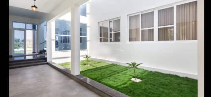 4BHK Villa with Private Pool & Sprawling Lawns Near Bangalore | ( 4 ) — Inner Courtyard & Covered Verandah