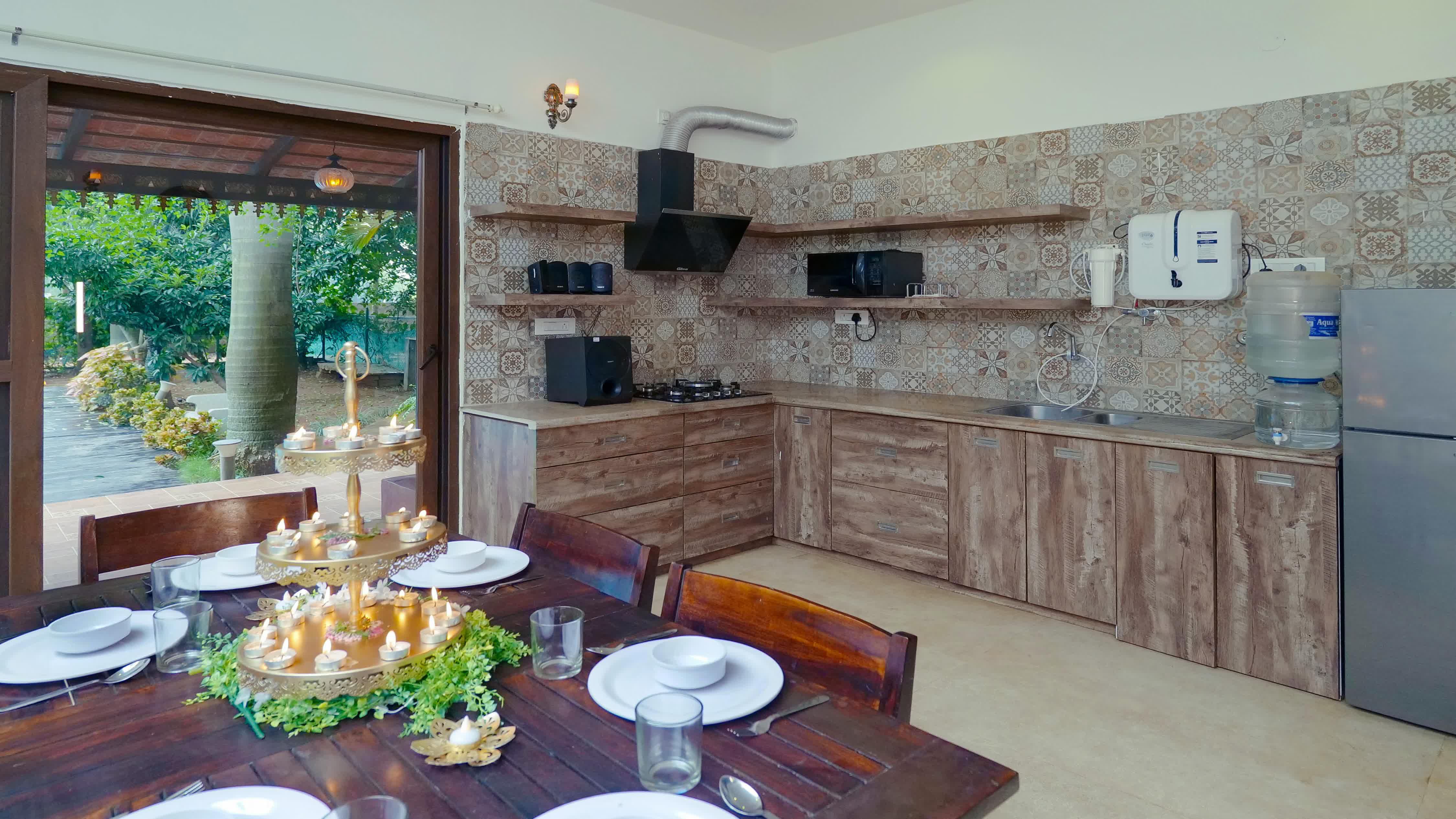 Boutique Pool Villa with Waterfall and Tropical Garden 8 — Styled Outdoor and Indoor Dining Setups