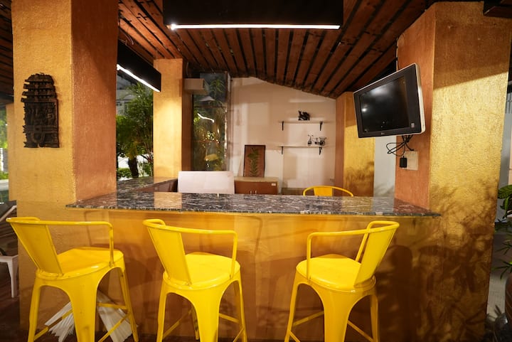 Farmhouse Resort with Pool, Pavilion, Bar and Game Room (  7 ) — Indoor Bar Counter with Yellow Bar Stools