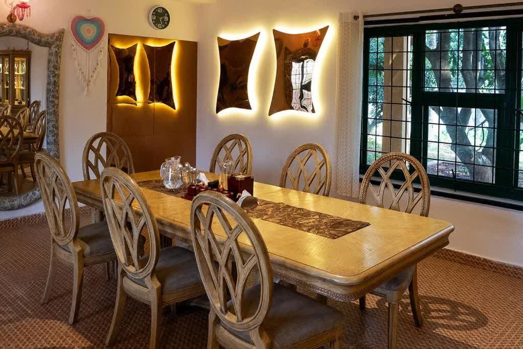 Contemporary 5BHK Pool Villa on 1-Acre Farm near Hennur 9 — Ornate Carved Dining Room