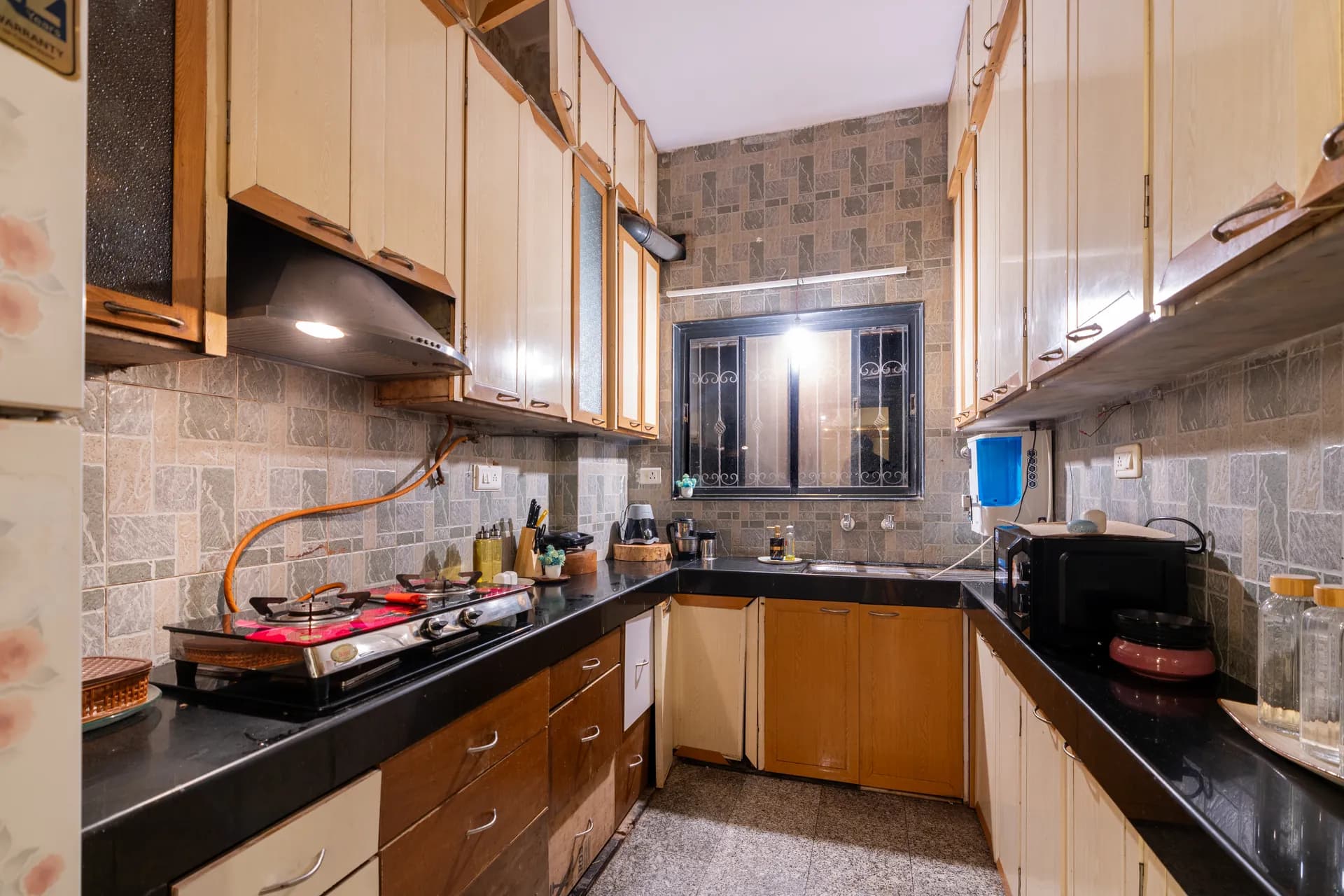 Soho Nest – 4BHK Wooden Retreat with Garden & Fountain — Kitchen