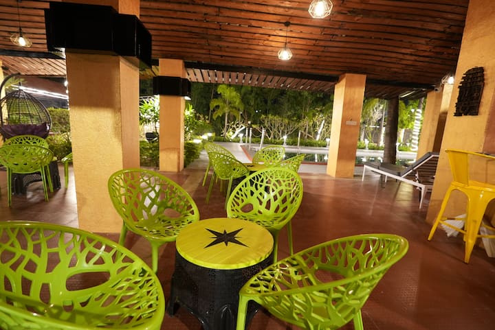 Farmhouse Resort with Pool, Pavilion, Bar and Game Room (  7 ) — Teak Wood Open Pavilion with Green Lattice Chairs