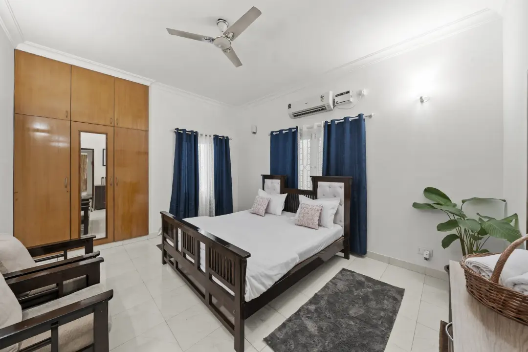 Cascade Castle – 5BHK Luxury Villa with Indoor Pond — First Bedroom