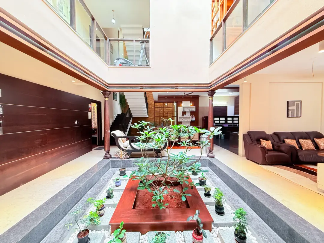 Lagoon Luxe – 4BHK Luxury Villa with Rooftop Pool — Indoor Courtyard