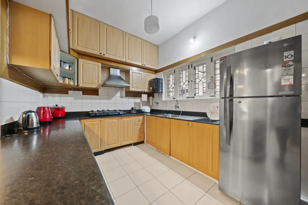 Cascade Castle – 5BHK Luxury Villa with Indoor Pond — Kitchen