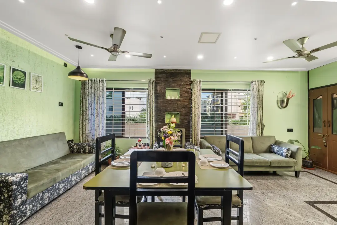 Serene Springs – 4BHK Luxury Villa with Private Home Cinema — Dining Area